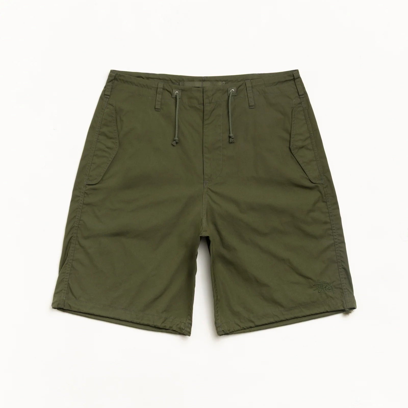 Green shorts on a white background