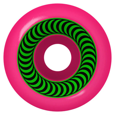 Spitfire OG Classics Formula Four skateboard wheels 99a in assorted colors, shown on a skateboard deck.