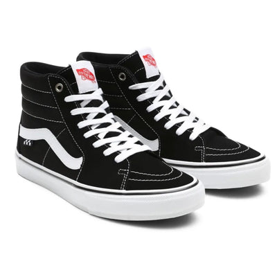 Vans Skate Sk8-Hi shoes in black and white with high-top design, laces, and Vans branding on the side.