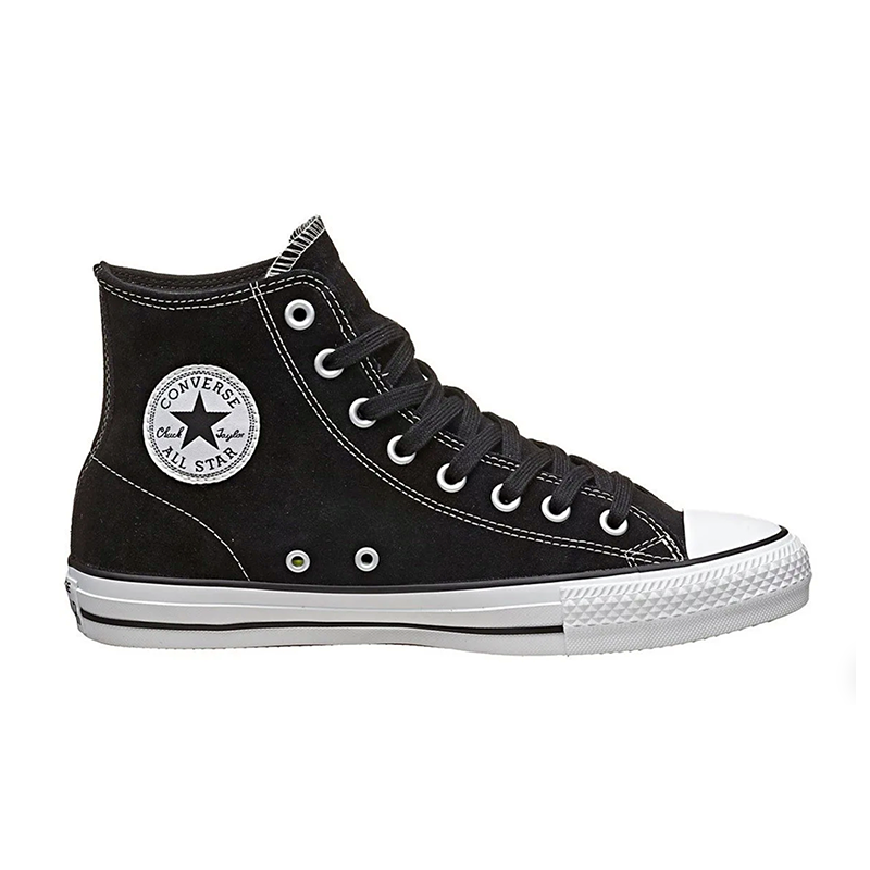Black and white Converse Chuck Taylor All Star Suede shoes, classic high-top design with white rubber sole and logo detail.