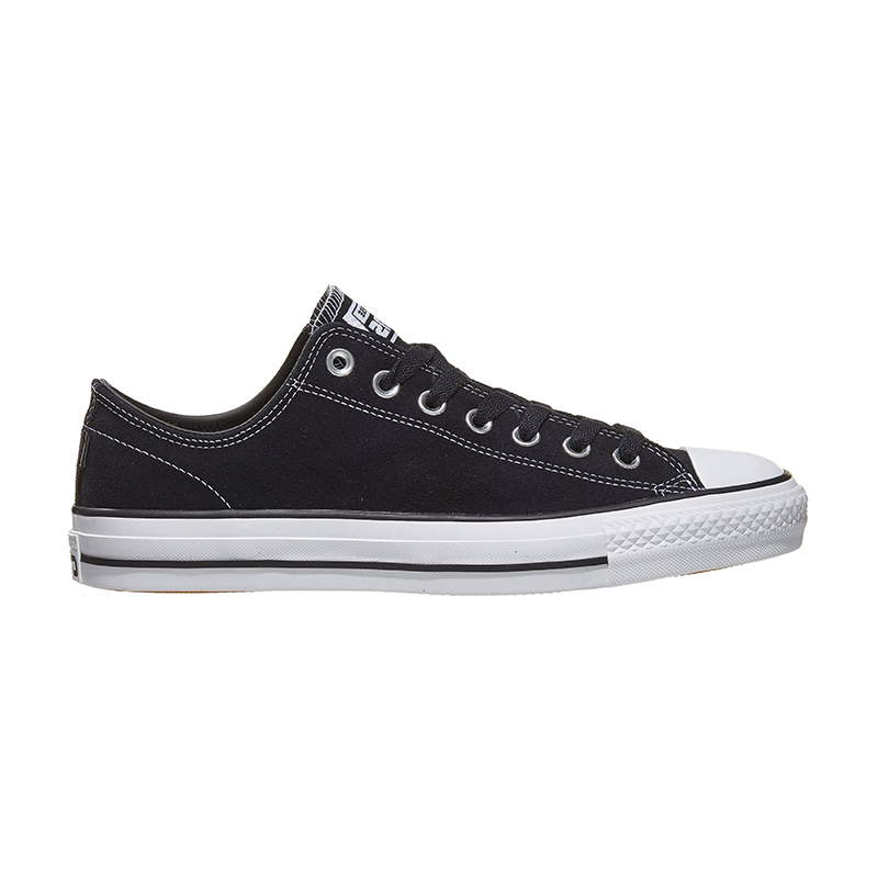 Black and white Converse Chuck Taylor All Star Suede shoes, classic high-top sneakers with white laces and rubber soles.
