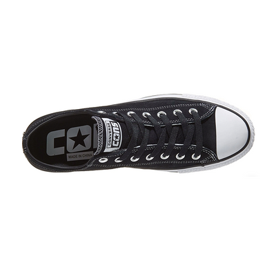 Black and white Converse Chuck Taylor All Star Suede shoes, classic low-top sneakers with white laces and rubber sole.