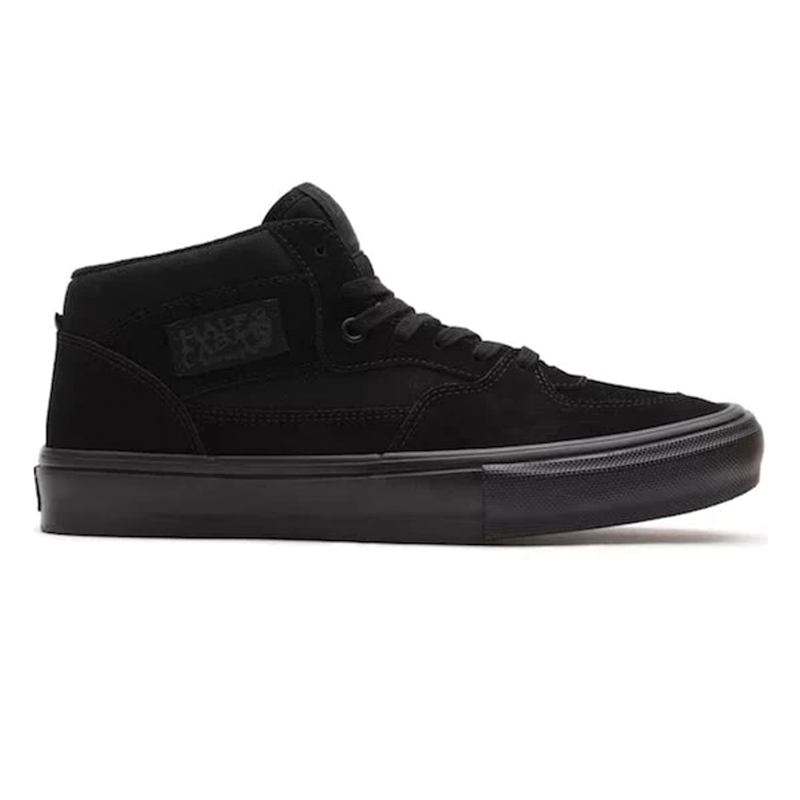 Black Vans Skate Half Cab shoes with classic low-top design, featuring black laces and Vans branding on the side.