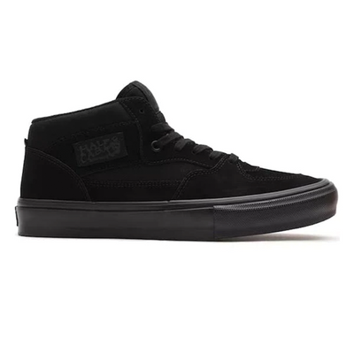 Black Vans Skate Half Cab shoes with classic low-top design, featuring black laces and Vans branding on the side.
