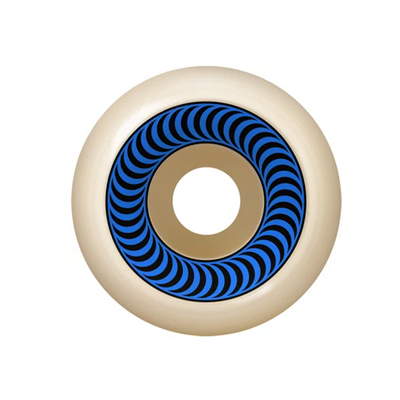 Spitfire OG Classics Formula Four skateboard wheels 99a in assorted colors, shown on a skateboard deck.